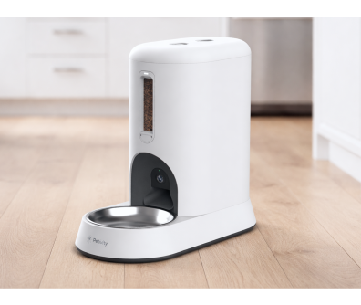 Petivity Smart Feeder for Cats on kitchen floor, white design with stainless steel bowl